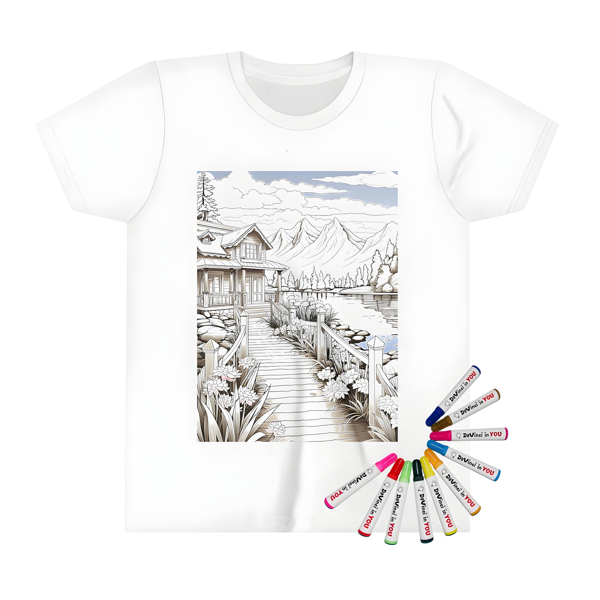 Coloring page inspired kid's t-shirt featuring serene lake scene with cabin, flowers and mountains