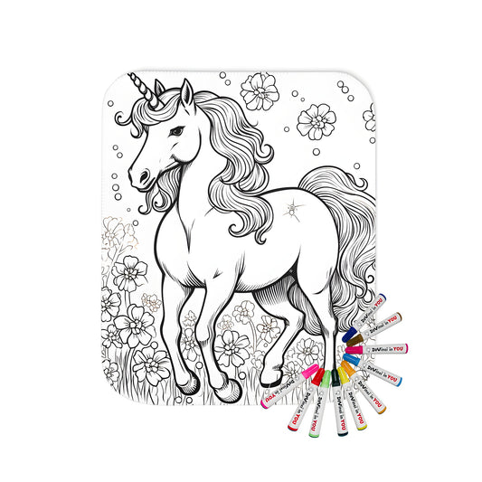 Blanket with colorful unicorn design in flower field