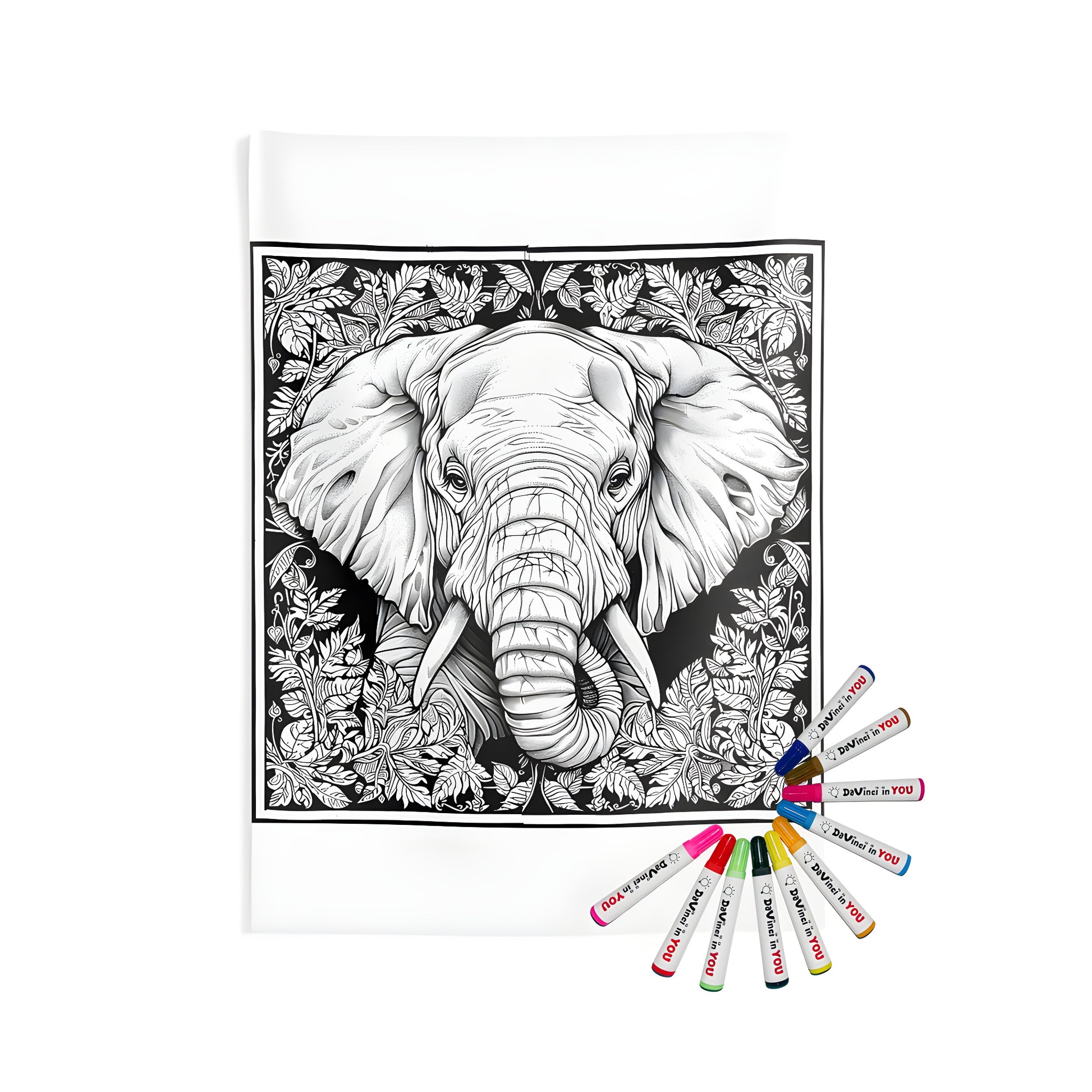 African savannah-inspired wall tapestry featuring an intricate elephant head design surrounded by jungle leaves, perfect for bohemian home decor. Includes 10 fabric markers for a fun coloring experience.