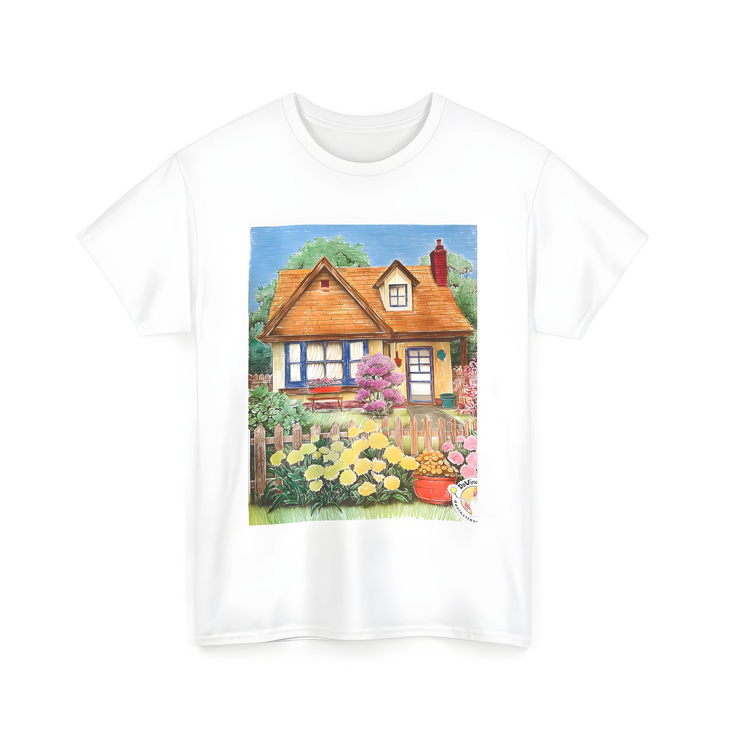 A colorful unisex t-shirt featuring a charming village scene of a cottage surrounded by a vibrant garden with flowers, bushes, and a picket fence under a blue sky.