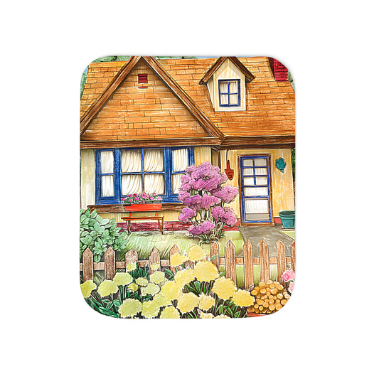 Cozy blanket with charming cottage design featuring a colorful garden, vibrant flowers, and a picket fence