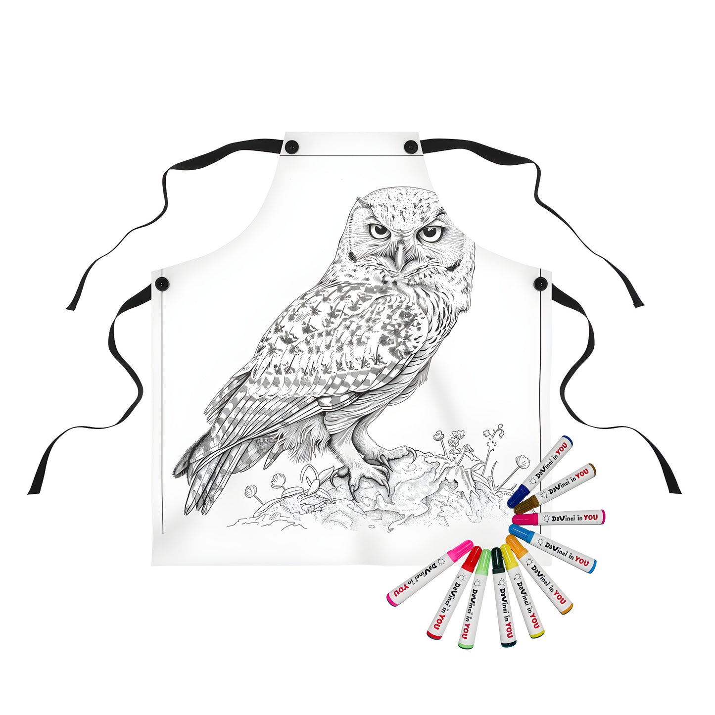 A colorful apron featuring a whimsical black and white owl design, perfect for kids' art projects and creative expression. Includes 10 vibrant fabric markers.