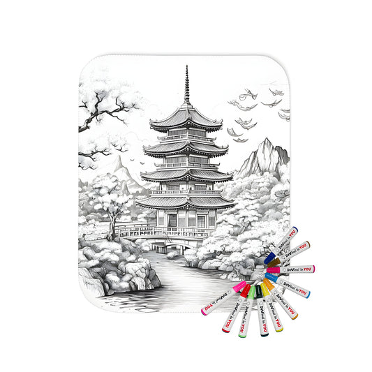 Coloring blanket featuring a detailed black and white illustration of a traditional temple or monastery by a river, surrounded by trees and mountains. Includes fabric markers for creative fun.