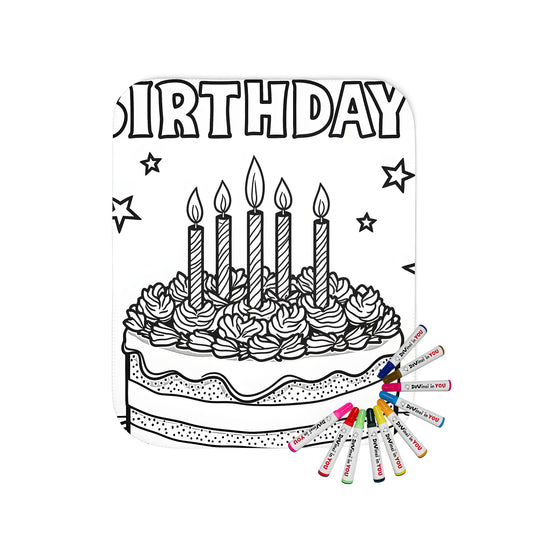 Birthday-themed blanket with colorful illustrations of cakes, candles, and 'Happy Birthday' text on a soft fabric background.