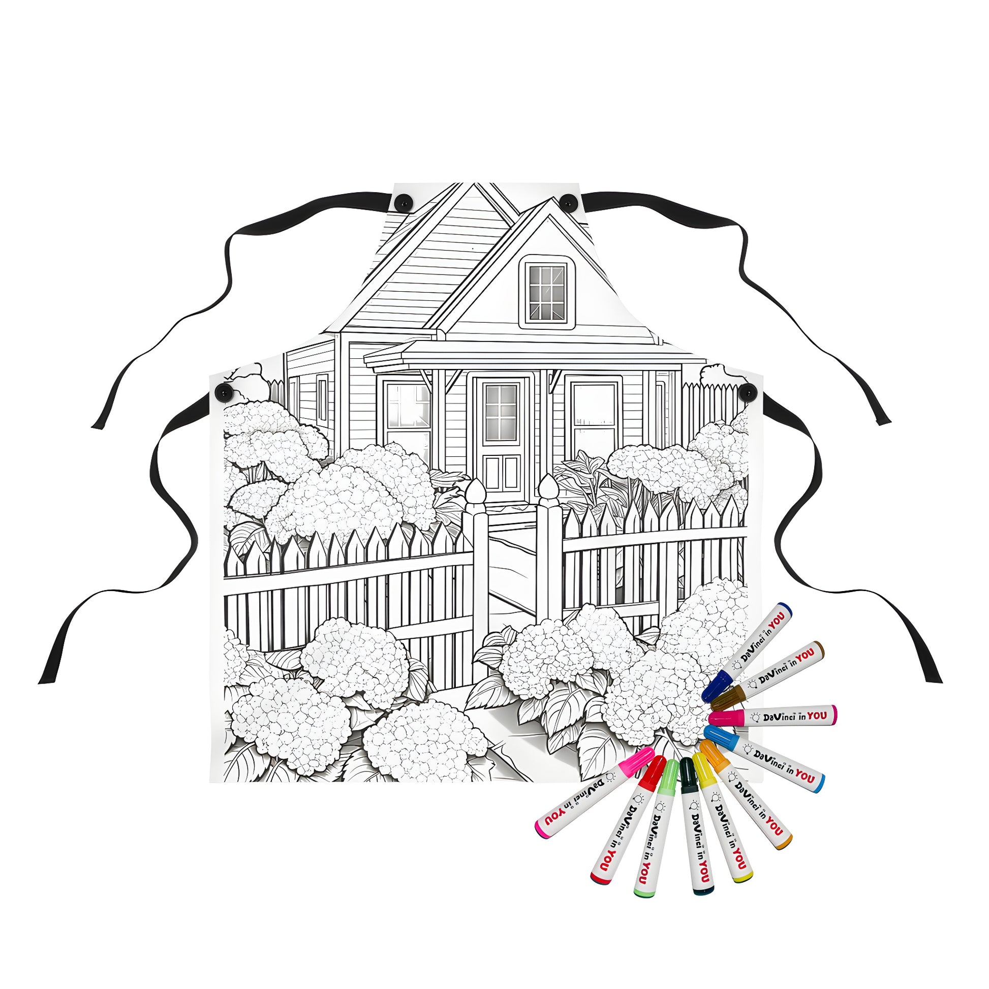 Cottage-themed apron for adults featuring a whimsical black and white coloring page design with a picket fence and flower bushes