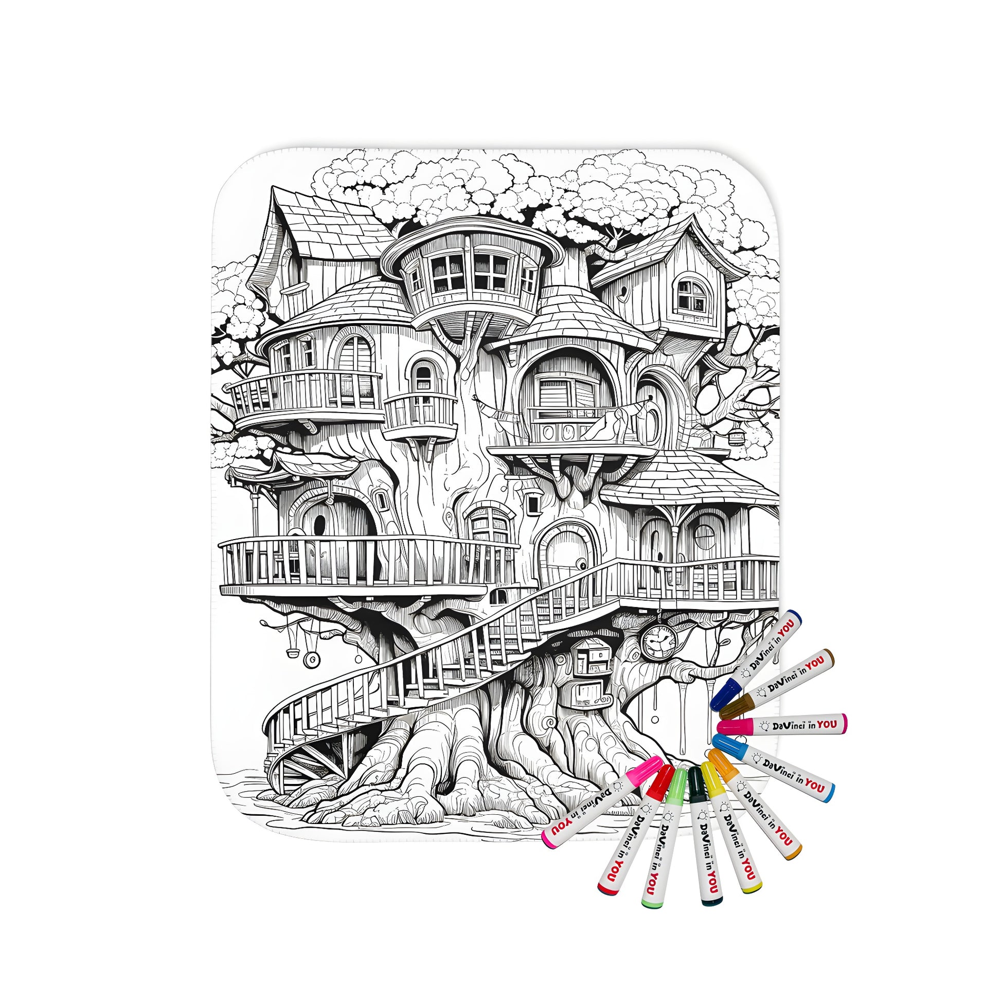 Cozy blanket featuring a detailed illustration of a whimsical treehouse with multiple levels, stairs, and architectural details. Includes a set of vibrant fabric markers for coloring.