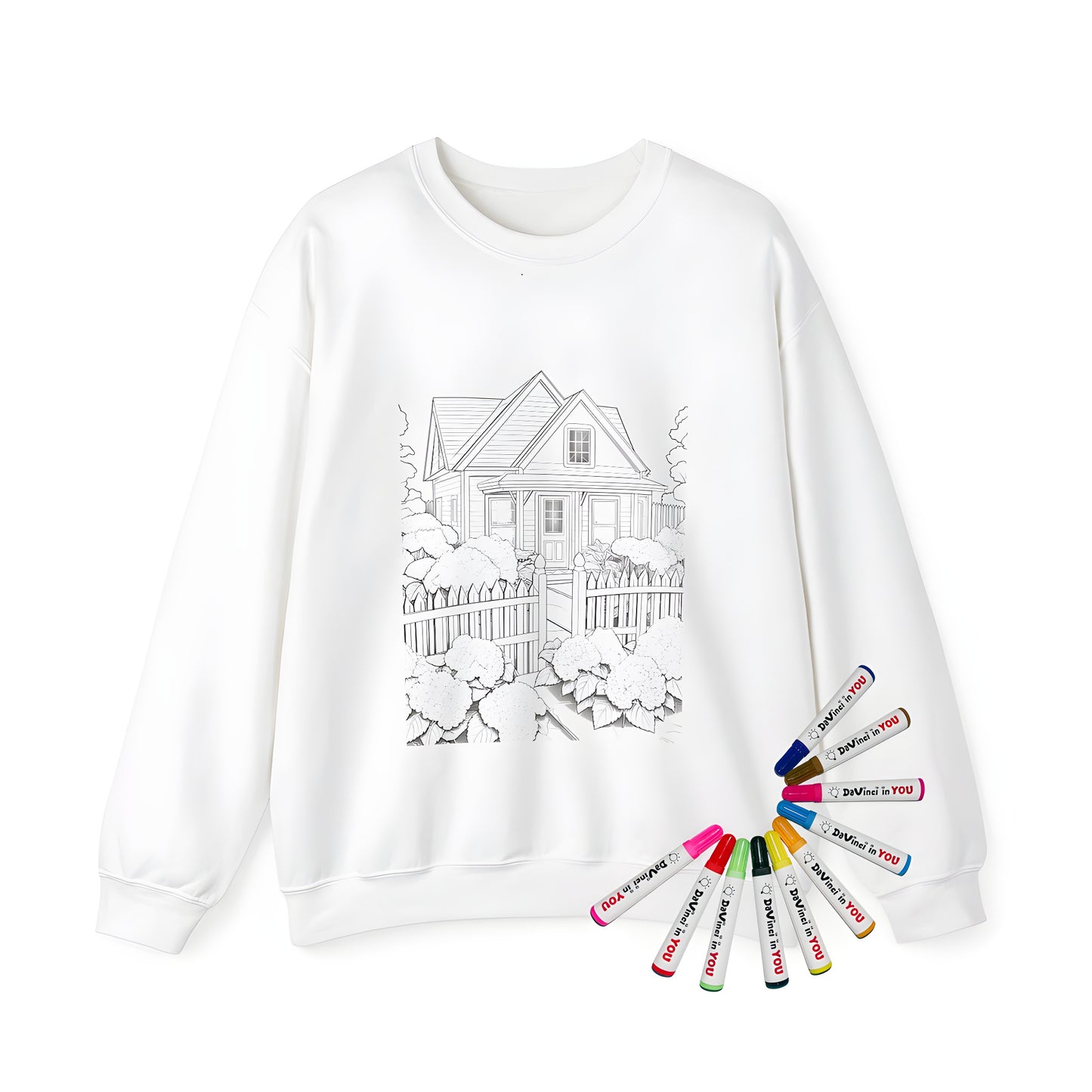 Adult sweatshirt with cozy cottage design featuring a black and white coloring page of a charming house with a picket fence and flower bushes in front