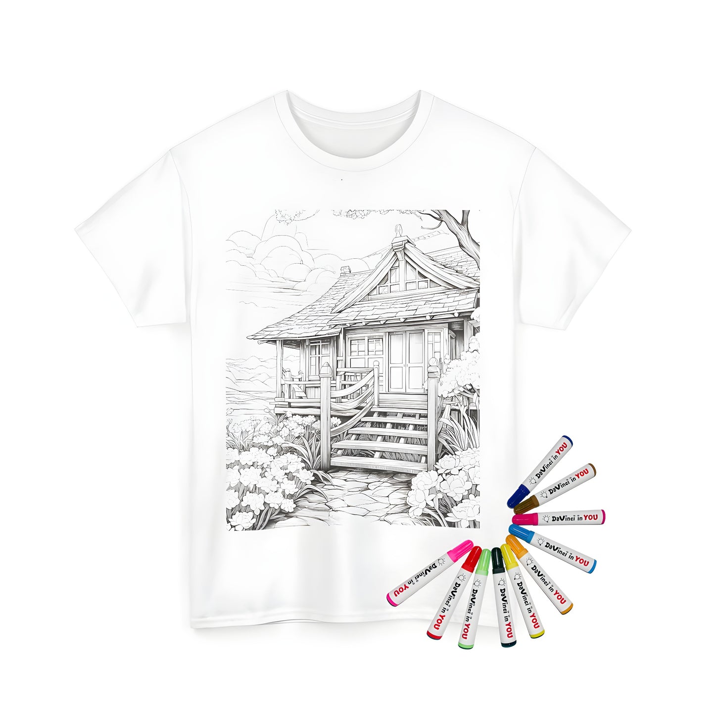 Coloring kit for unisex t-shirts featuring a whimsical black and white illustration of a cozy village cottage, garden, walkway, and staircase - perfect for artistic expression.