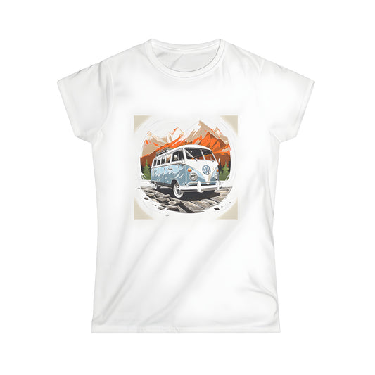 A colorful illustration of a classic VW van parked in front of snowy mountains and trees on a women's t-shirt