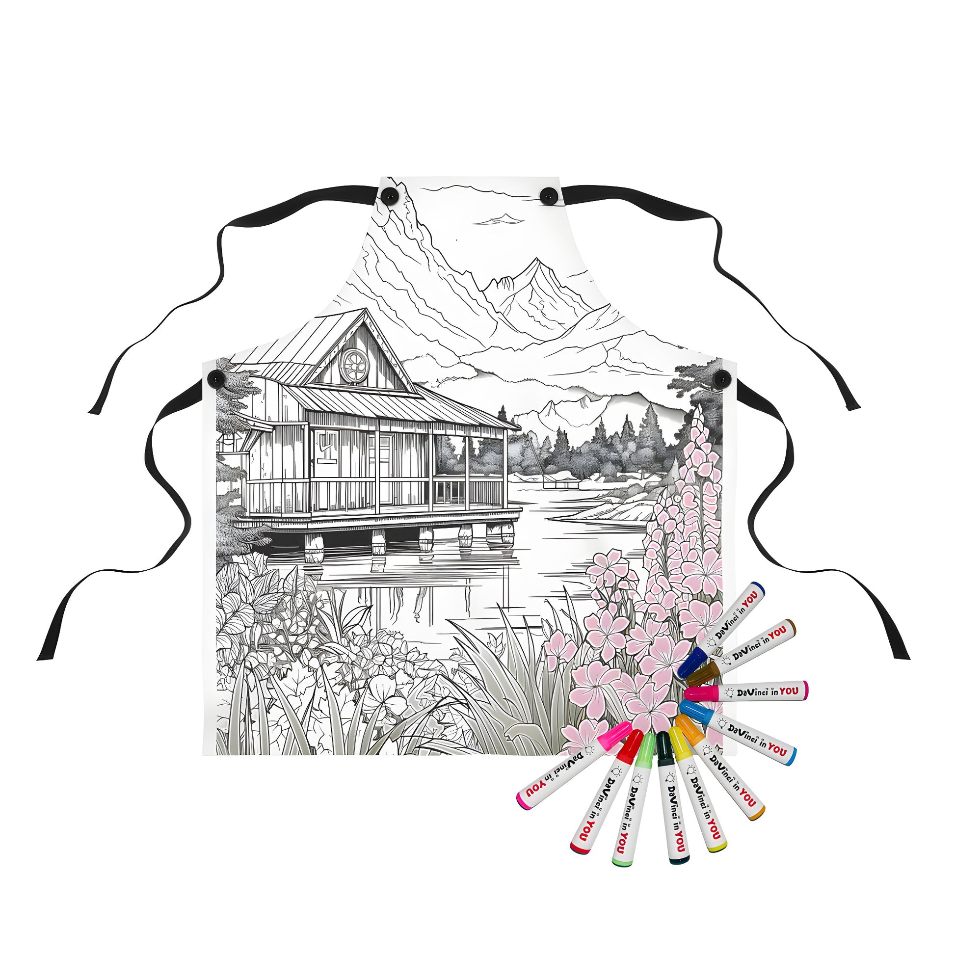 Coloring apron with mountain cabin landscape art, featuring a wooden cabin by lake and blooming flowers