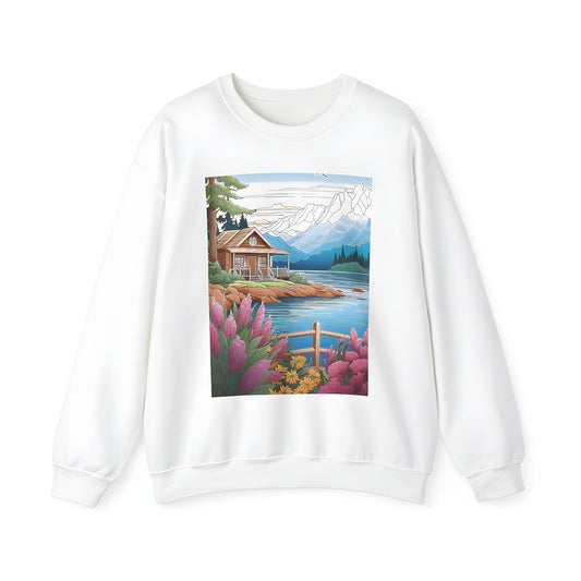 Adult sweatshirt featuring a vibrant graphic of a serene mountain cabin scene with a lake view