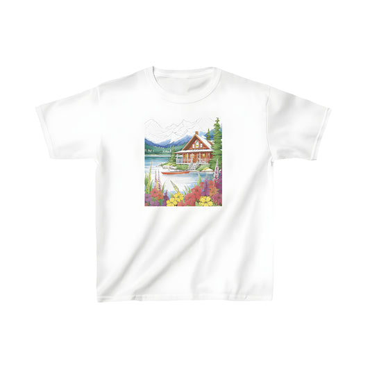 Colorful Kids' T-Shirt featuring a serene mountain lodge scene by a lake with vibrant flowers and majestic peaks