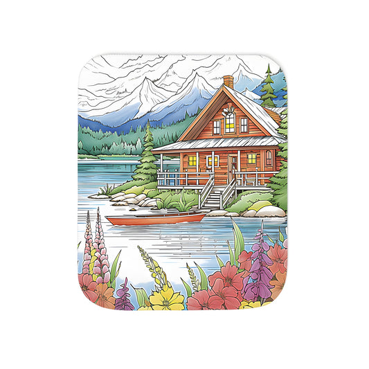 Cozy blanket featuring serene mountain cabin-inspired design with vibrant flowers and majestic peaks