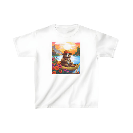 Colorful kid's t-shirt featuring an adorable bear wearing a hat and tie sitting in a boat on a serene river, surrounded by vibrant flowers and majestic mountains during a picturesque sunset. Includes fun nautical elements for kids who love adventure.