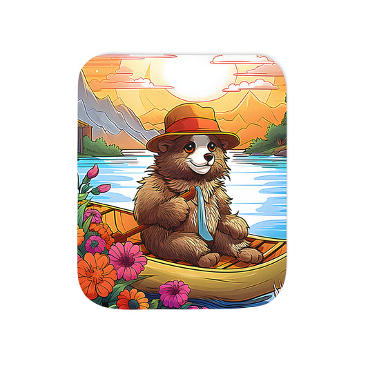 Cozy blanket featuring a charming bear wearing a hat and tie sitting in a boat on a serene river surrounded by colorful flowers and majestic mountains at sunset.