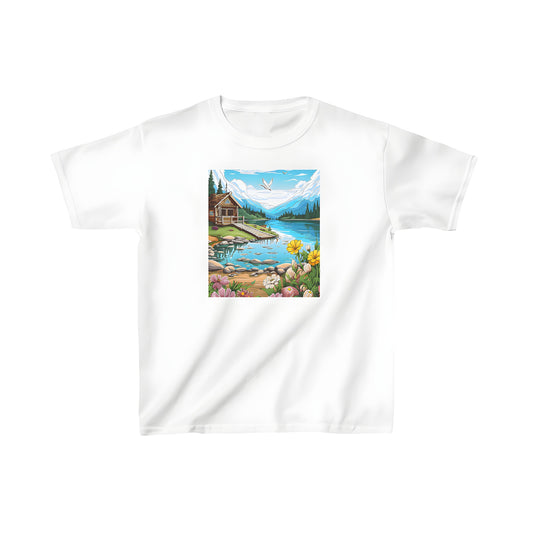 Cozy cabin scene on a kid's t-shirt, featuring a serene lake, colorful flowers, and majestic mountains