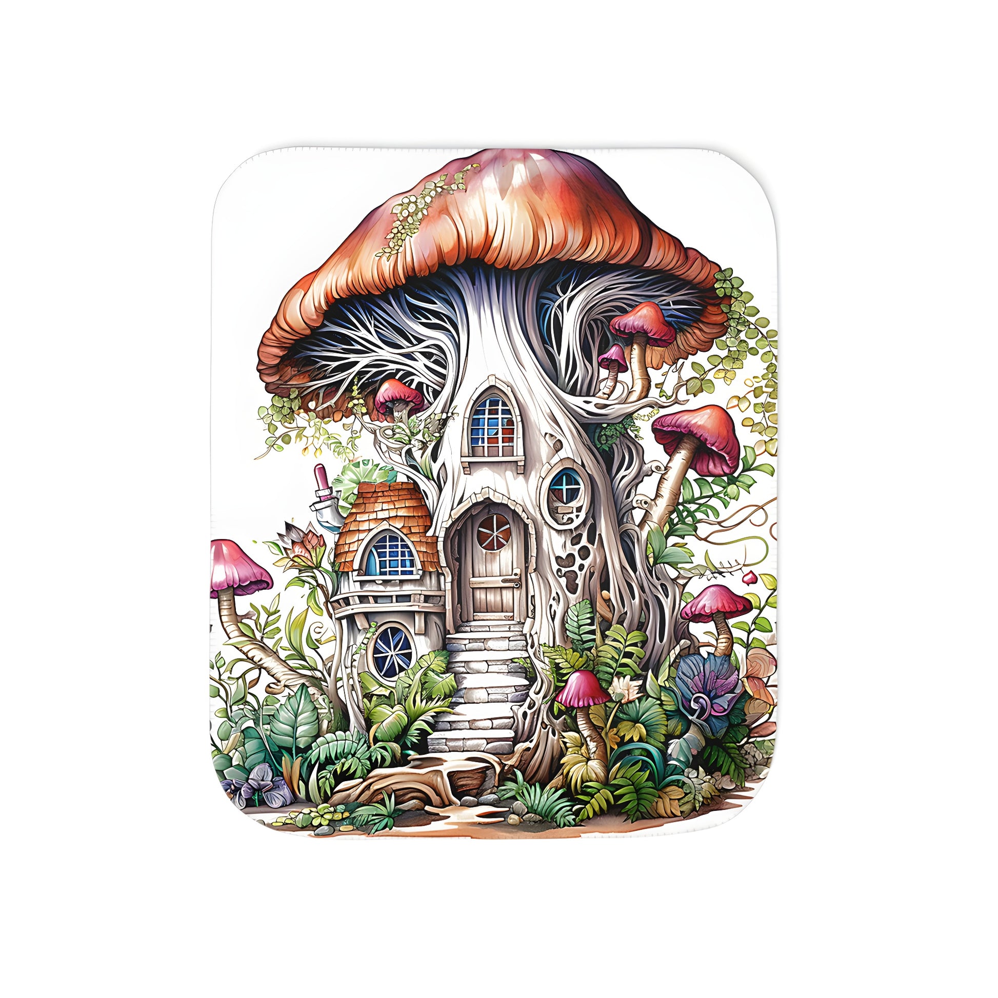 Colorful blanket with whimsical tree house design featuring a mushroom cap roof and lush greenery