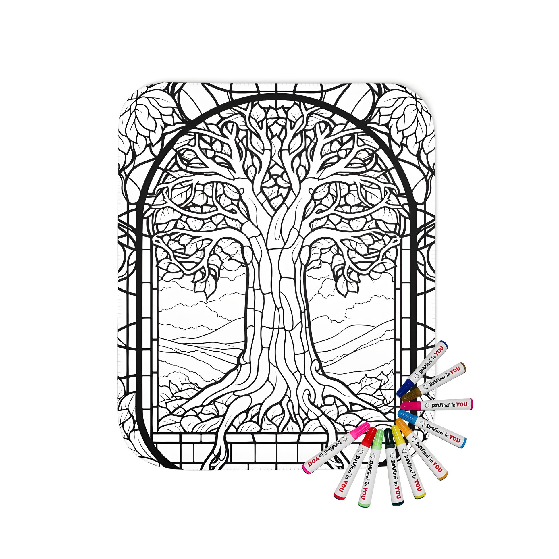 Cozy blanket with an intricate tree design featuring stained glass-inspired art, leaves, and branches, set against a natural landscape