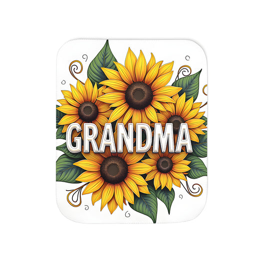 Colorful graphic blanket featuring vibrant sunflowers, daisies, and a bold 'GRANDMA' print