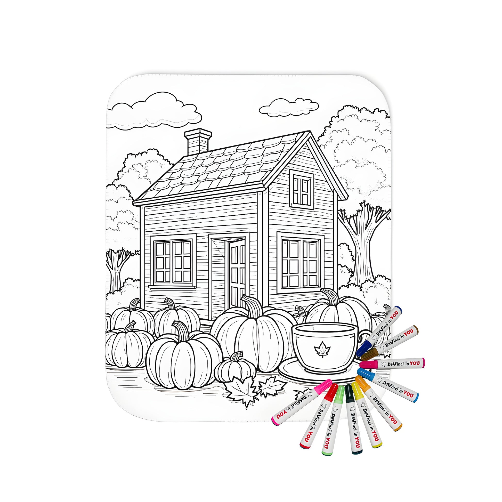 Cozy blanket with charming country cottage design featuring pumpkins and trees, evoking a peaceful autumn atmosphere