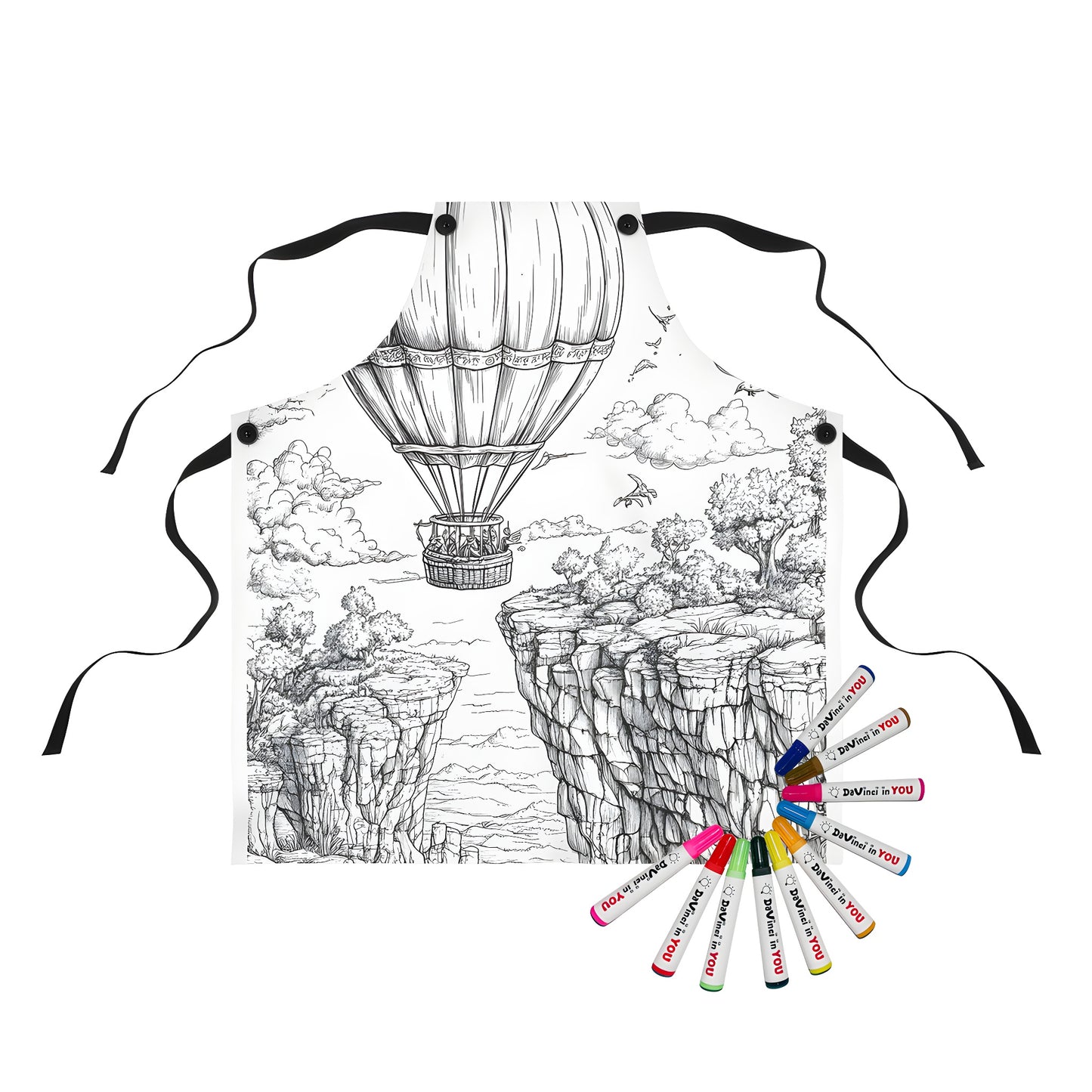 Hot Air Balloon Apron featuring a detailed drawing of a hot air balloon soaring over a canyon landscape, surrounded by trees and birds.