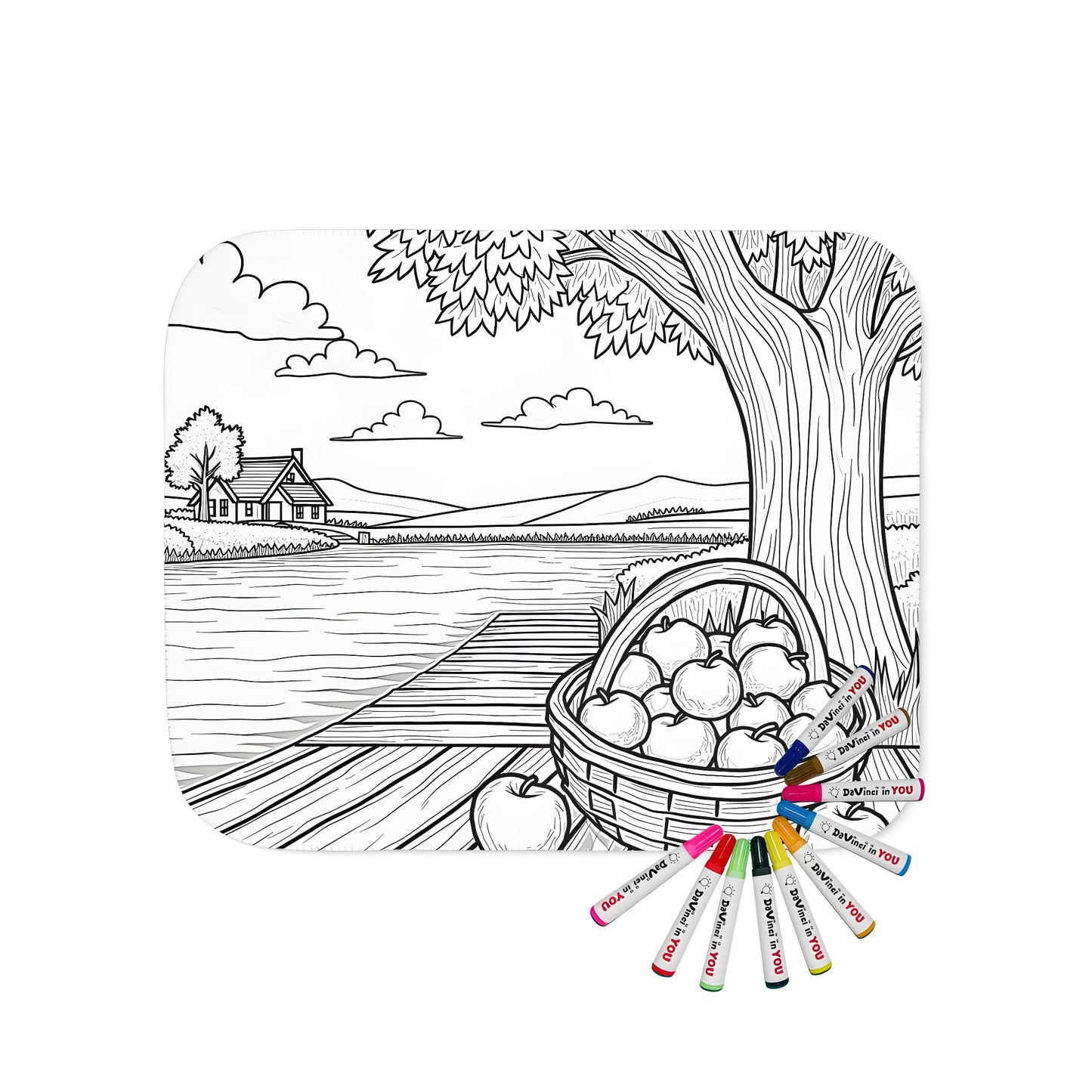 Cozy blanket featuring a countryside-inspired coloring page design of a basket of apples on a wooden dock beside a tree, overlooking a serene river landscape.