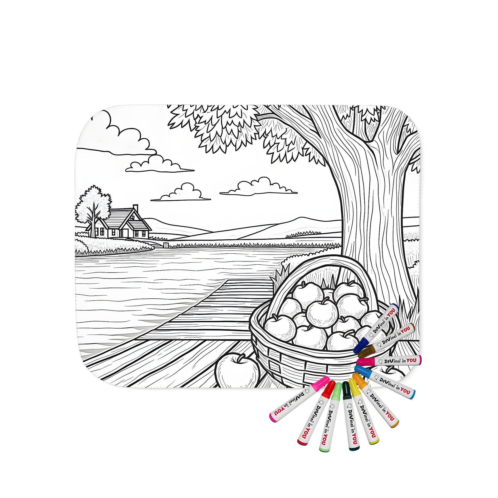 Cozy blanket featuring a countryside-inspired coloring page design of a basket of apples on a wooden dock beside a tree, overlooking a serene river landscape.