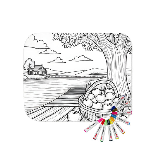 Cozy blanket featuring a countryside-inspired coloring page design of a basket of apples on a wooden dock beside a tree, overlooking a serene river landscape.