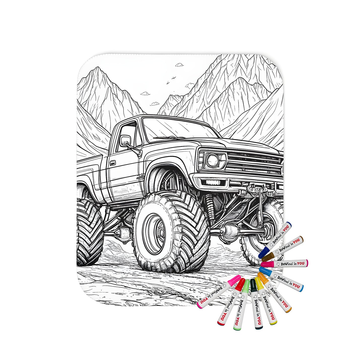 Coloring kit blanket featuring a detailed drawing of a truck with large wheels against a backdrop of mountains and clouds.