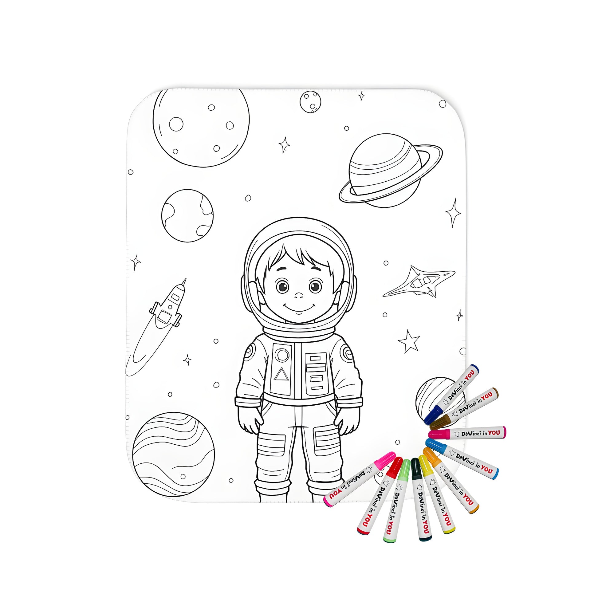 Coloring blanket featuring a young astronaut in space, planets, stars, and spaceships