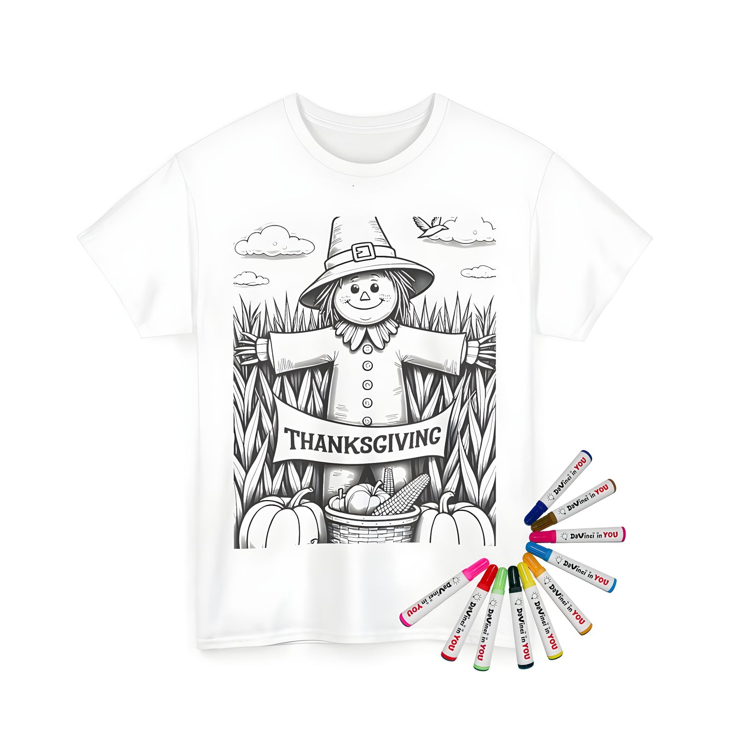 Coloring kit on unisex t-shirt featuring black and white design of scarecrow in field holding 'Thanksgiving' banner with pumpkins and corn