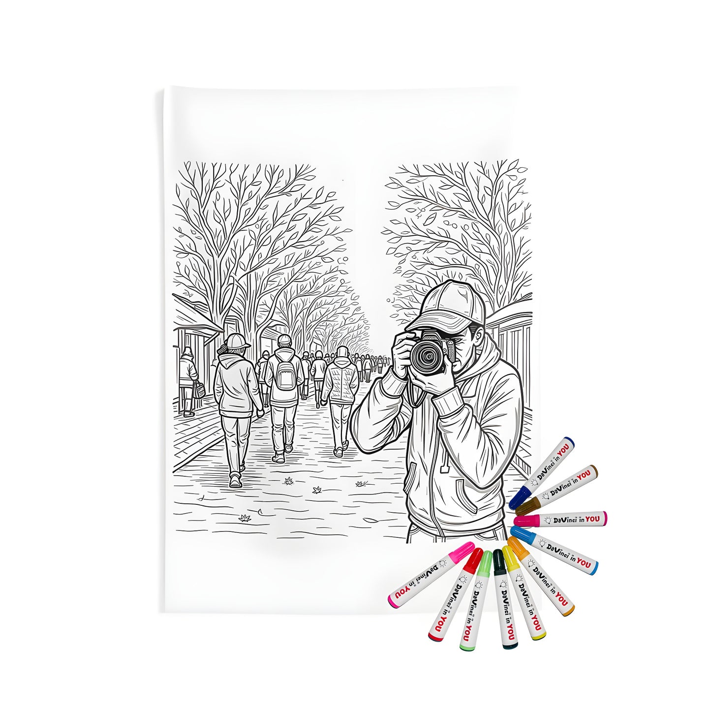 Indoor wall tapestries coloring kit with fabric markers. A beautiful black and white illustration of a photographer taking a picture on a tree-lined city street bustling with people. Perfect for home decor, art projects, or gifts.
